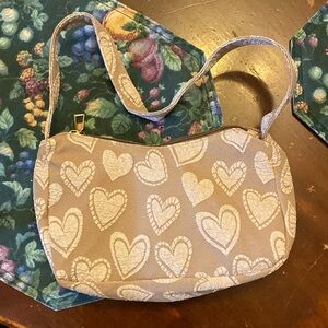 Small purse w/ make up brushes